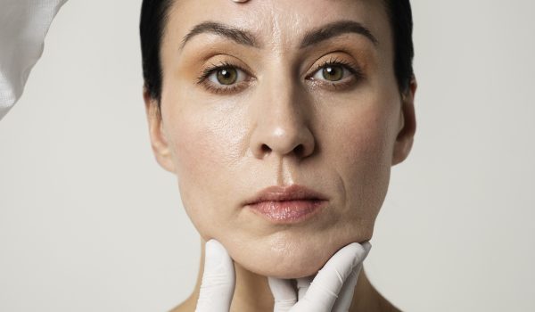 front-view-hands-touching-woman-s-face